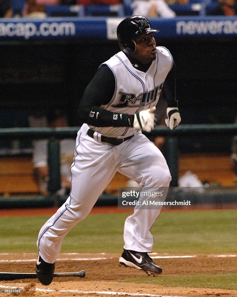 Al Reyes Devil Rays Tampa Bay Devil Rays outfielder Carl Crawford races to first base ...