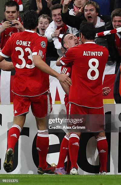 Franck Ribery of Bayern Muenchen celebrates scoring their first goal with Hamit Altintop during the UEFA Champions League quarter final first leg...