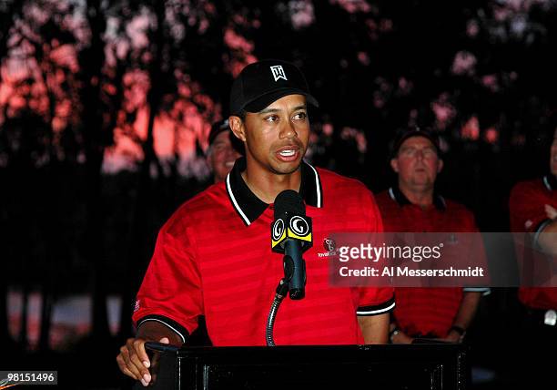 Tiger Woods talks to the fans on the 18th green after play in the 2005 Tavistock Cup at Isleworth Country Club March 29.