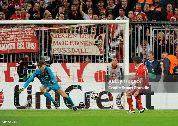 Ivica Olic of Bayern puts the ball past of Manchester to score the second goal during the UEFA Champions League quarter final, first leg match...