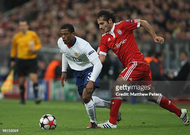 Patrice Evra of Manchester United and Hamit Altintop of Bayern Munich in action during the UEFA Champions League Quarter-Final First Leg match...