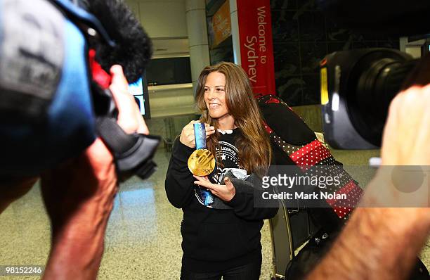 Vancouver 2010 Winter Olympics gold-medalist Torah Bright talks to the media after returning home with her gold medal at Sydney International Airport...