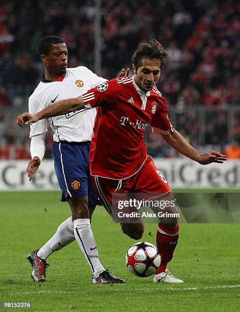 Hamit Altintop of Bayern Muenchen is nchallenged by Patrice Evra of Manchester United during the UEFA Champions League quarter final first leg match...