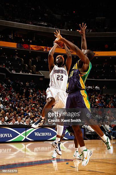 Ronald "Flip" Murray of the Charlotte Bobcats shoots against Emeka Okafor of the New Orleans Hornets during the game on February 6, 2010 at the Time...
