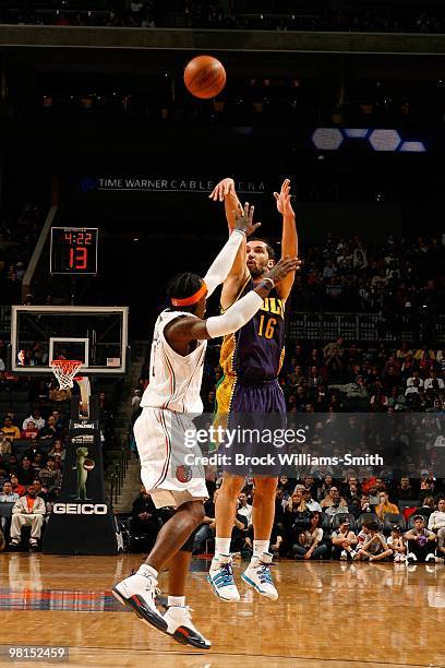 Peja Stojakovic of the New Orleans Hornets takes a jump shot against Gerald Wallace of the Charlotte Bobcats during the game on February 6, 2010 at...