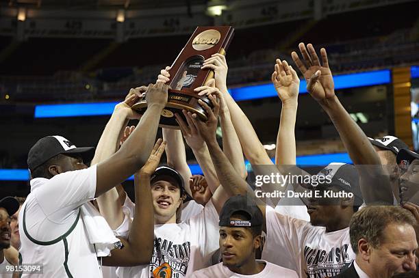 Playoffs: Michigan State players victorious with Midwest Regional trophy plaque after winning game vs Tennessee. St. Louis, MO 3/28/2010 CREDIT:...