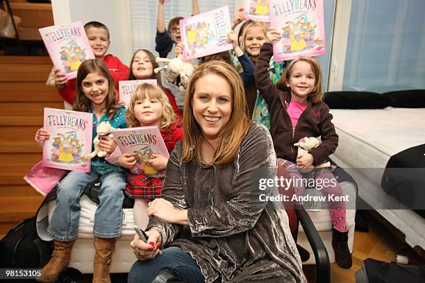 New York Times bestselling children's author Laura Numeroff poses with children holding her new book "The Jellybeans and the Big Book Bonanza" at the...