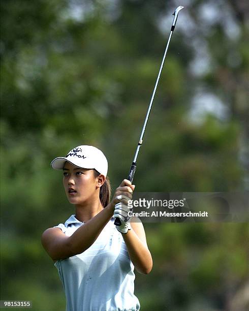Michelle Wie, a 13-year-old amateur from Honolulu, follows her shot from the 5th fairway at the LPGA Jamie Farr Kroger Classic August 15, 2003 in...