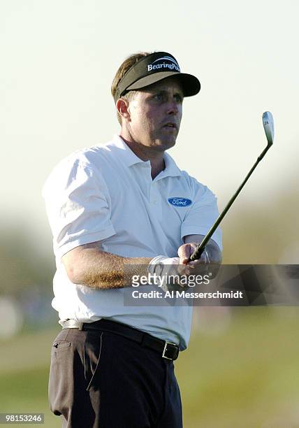 Phil Mickelson follows a shot into the 18th green during first round competition January 29, 2004 at the 2004 FBR Open at the Tournament Players Club...