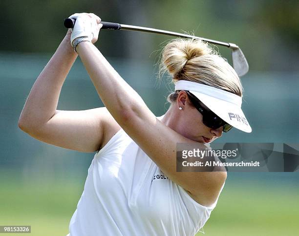 Hilary Lunke, winner of the 2003 U. S. Open, practices a fairway shot at the Jamie Farr Kroger Classic August 11, 2003 in Sylvania, Ohio.