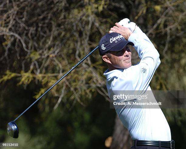 Jonathan Kaye follows a tee shot on the second hole during first round competition January 29, 2004 at the 2004 FBR Open at the Tournament Players...