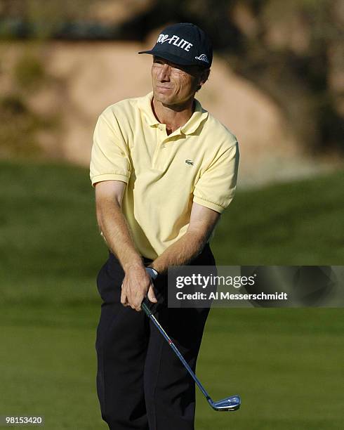 Bernhard Langer checks a fairway shot into the fifth hole during first round competition January 29, 2004 at the 2004 FBR Open at the Tournament...