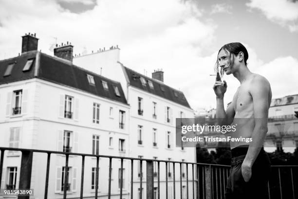 Model poses backstage prior the Juun J Menswear Spring Summer 2019 show as part of Paris Fashion Week on June 22, 2018 in Paris, France.