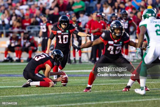 Ottawa RedBlacks kicker Lewis Ward kicks a field goal during Canadian Football League action between Saskatchewan Roughriders and Ottawa RedBlacks on...