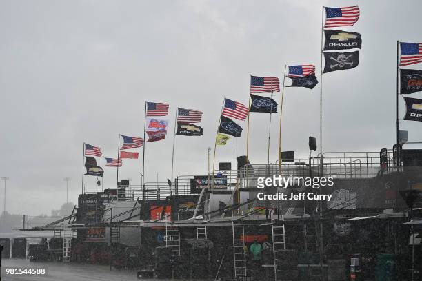 Rain falls prior to practice for the NASCAR Camping World Truck Series Villa Lighting delivers the Eaton 200 at Gateway Motorsports Park on June 22,...