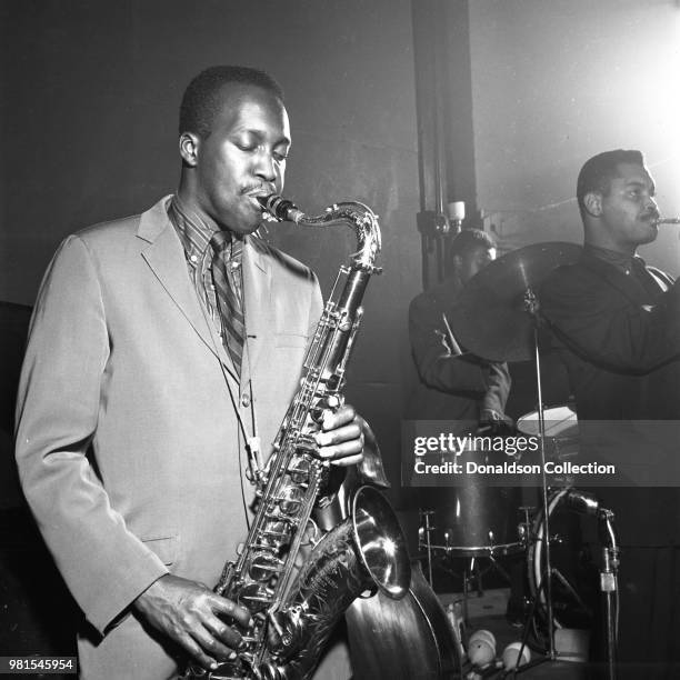 Saxophonist Hank Mobley and trumpeter Art Farmer perform onstage on December 28, 1956 in New York.