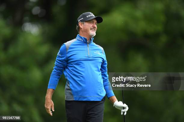 Jerry Kelly watches his tee shot on the second hole during the first round of the American Family Insurance Championship at University Ridge Golf...