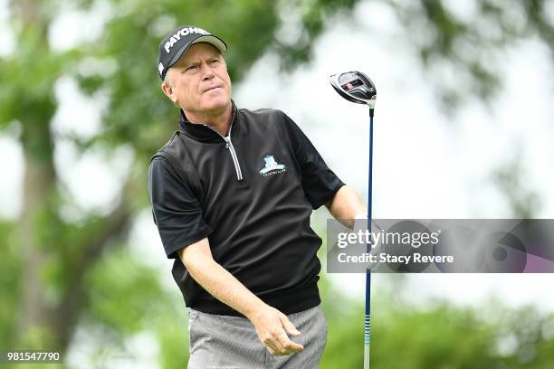 Jeff Sluman hits his tee shot on the ninth hole during the first round of the American Family Insurance Championship at University Ridge Golf Course...