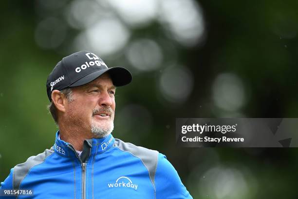 Jerry Kelly watches his tee shot on the second hole during the first round of the American Family Insurance Championship at University Ridge Golf...