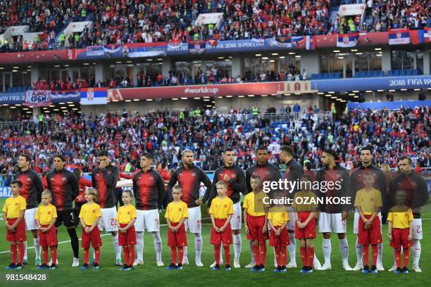 Switzerland's defender Stephan Lichtsteiner, goalkeeper Yann Sommer, defender Fabian Schaer, midfielder Steven Zuber, midfielder Valon Behrami,...