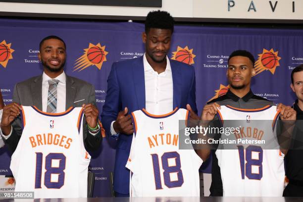 Mikal Bridges, Deandre Ayton and Elie Okoo of the Pheonix Suns pose together following press conference at Talking Stick Resort Arena on June 22,...