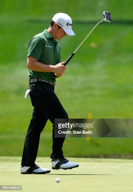 Brian Harman reacts his putt on the eighth hole during the second round of the Travelers Championship at TPC River Highlands on June 22, 2018 in...