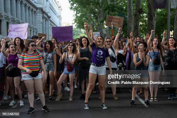 Protesters demonstrate against the release of the 'La Manada' gang members on June 22, 2018 in Madrid, Spain. The High Court of Navarra has ordered...