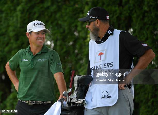 Brian Harman waits to play his tee shot on the ninth hole during the second round of the Travelers Championship at TPC River Highlands on June 22,...