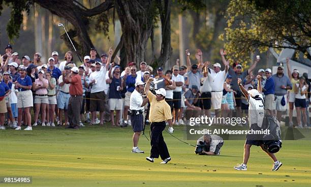 Craig Parry of Australia tosses his club and dances to end the final round of the PGA Tour Ford Championship at Doral in Miami, Florida March 7,...