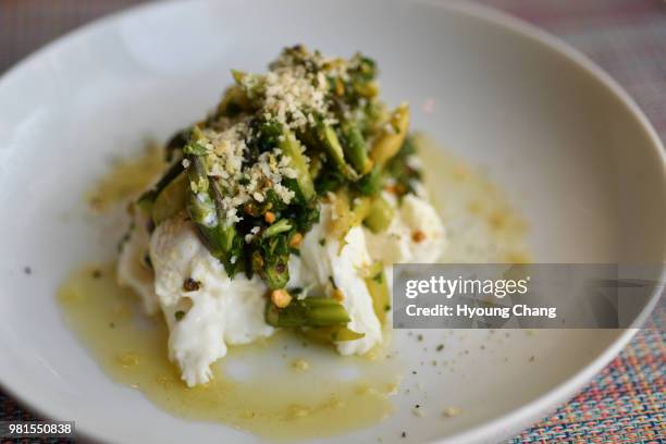 Jerk Romanesco, cauliflower, wild rice, pineapple chow-chow. 12@Madison, locates in Congress Park neighborhood, Denver June 22, 2018. The restaurant...