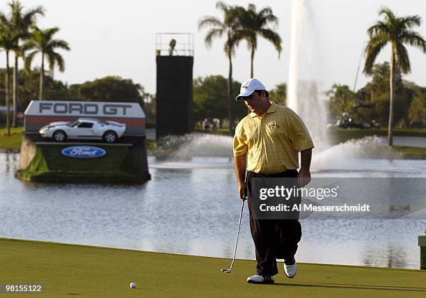 Craig Parry of Australia sets to putt on the 18th green in the final round of the PGA Tour Ford Championship at Doral in Miami, Florida March 7,...
