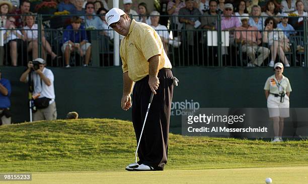 Craig Parry of Australia putts on the 18th green during the final round of the PGA Tour Ford Championship at Doral in Miami, Florida March 7, 2004....