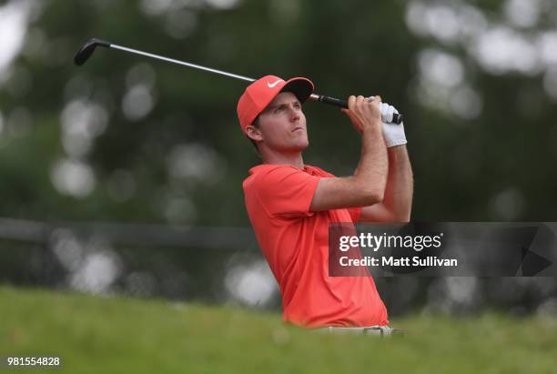 Russell Henley watches his tee shot on the 17th hole during the second round of the Travelers Championship at TPC River Highlands on June 22, 2018 in...