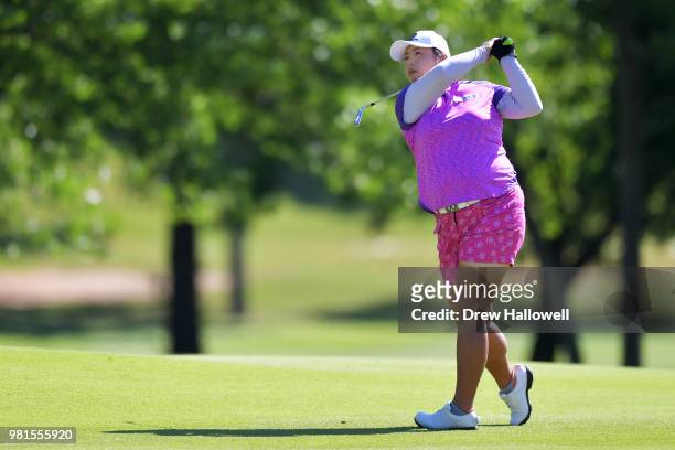 Shanshan Feng of China plays her a shot on the fourth hole during the first round of the Walmart NW Arkansas Championship Presented by P&G at...