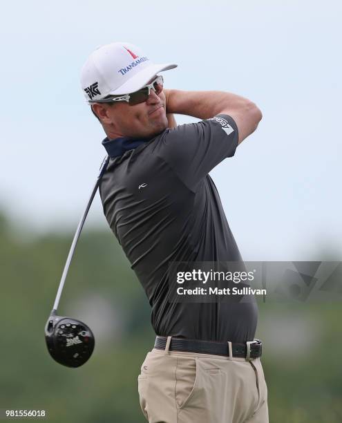 Zach Johnson watches his tee shot on the third hole during the second round of the Travelers Championship at TPC River Highlands on June 22, 2018 in...
