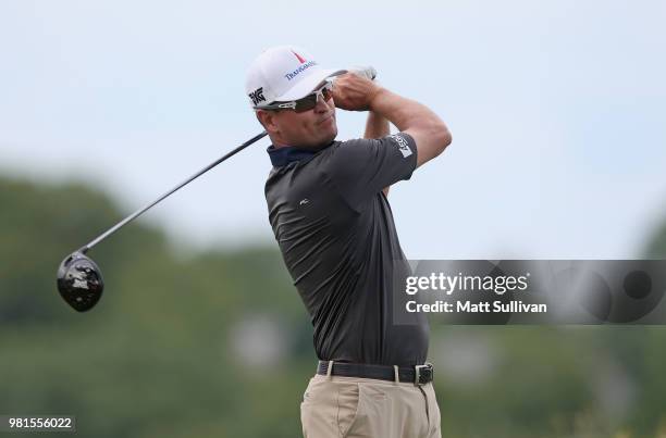 Zach Johnson watches his tee shot on the third hole during the second round of the Travelers Championship at TPC River Highlands on June 22, 2018 in...