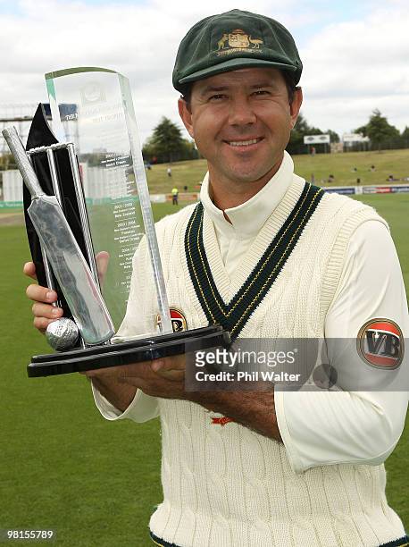 Australian captain Ricky Ponting poses with the National Bank Series Test Trophy following day five of the Second Test match between New Zealand and...