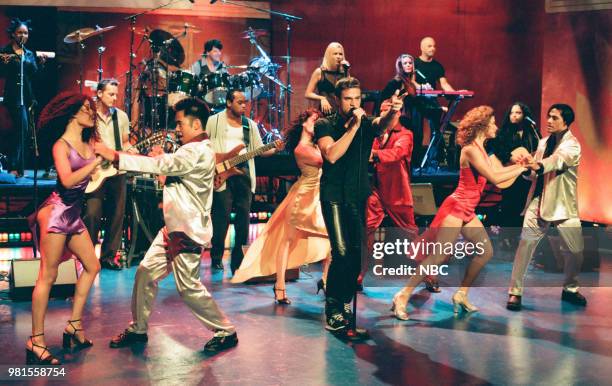 Episode 1622 -- Pictured: Musical guest Enrique Iglesias performing on June 09, 1999 --