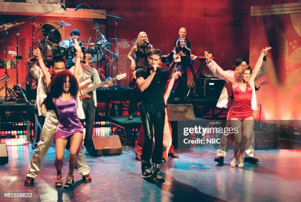 Episode 1622 -- Pictured: Musical guest Enrique Iglesias performing on June 09, 1999 --