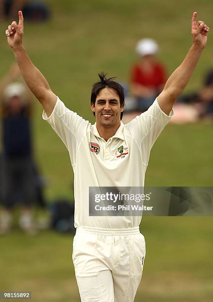 Mitchell Johnson of Australia celebrates his 6th wicket of Tim Southee of New Zealand to win the match during day five of the Second Test match...