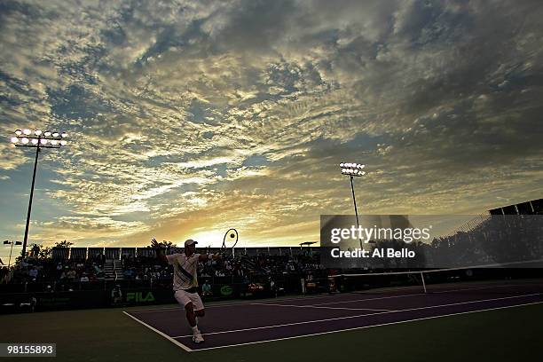 Fernando Verdasco returns a shot against Marin Cilic of Croatia during day eight of the 2010 Sony Ericsson Open at Crandon Park Tennis Center on...