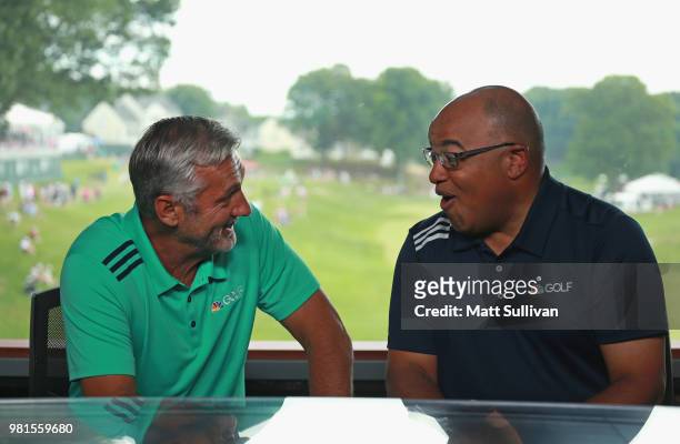 Sports announcers Mike Tirico and Frank Nobilo talk during the second round of the Travelers Championship at TPC River Highlands on June 22, 2018 in...