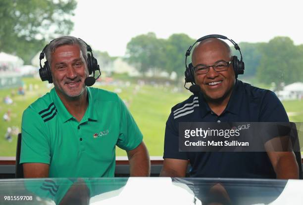 Sports announcers Mike Tirico and Frank Nobilo talk during the second round of the Travelers Championship at TPC River Highlands on June 22, 2018 in...