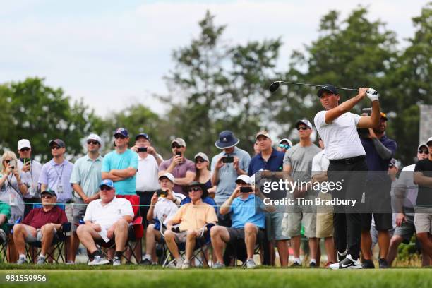 Jason Day of Australia watches his tee shot on the sixth hole during the second round of the Travelers Championship at TPC River Highlands on June...