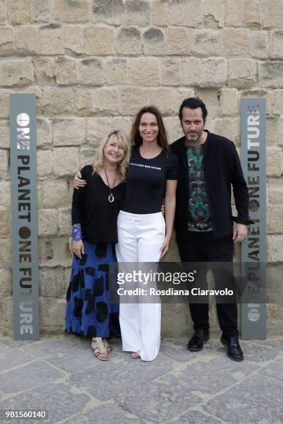 Beathrice Thomas, Anne de Carbuccia and Arghael Chatoux attend One Planet One Future Cocktail Party on June 22, 2018 in Naples, Italy.