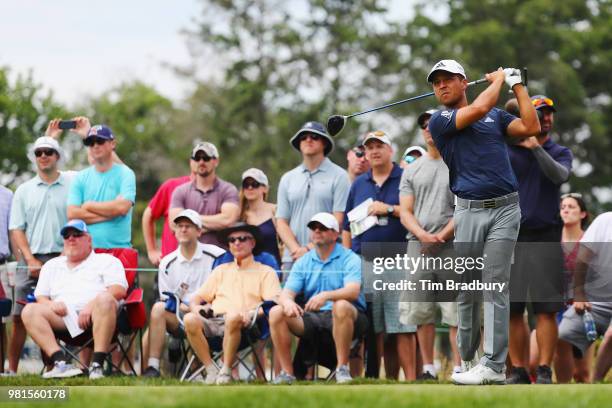Xander Schauffele watches his tee shot on the sixth hole during the second round of the Travelers Championship at TPC River Highlands on June 22,...