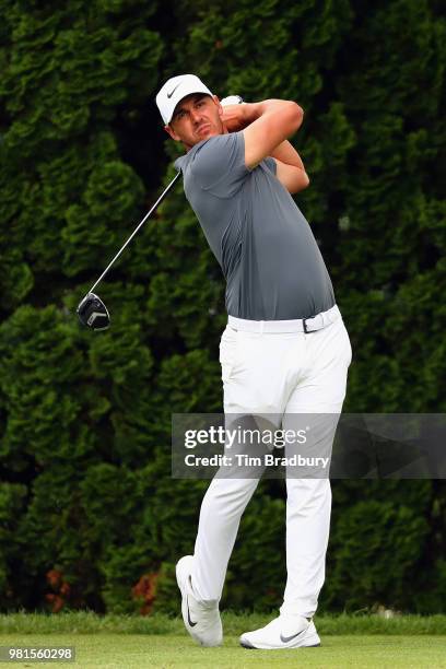 Brooks Koepka of the United States plays his shot from the ninth tee during the second round of the Travelers Championship at TPC River Highlands on...