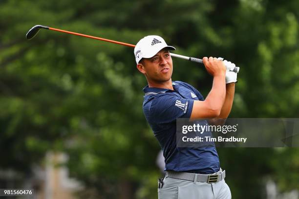 Xander Schauffele watches his second shot on the sixth hole during the second round of the Travelers Championship at TPC River Highlands on June 22,...