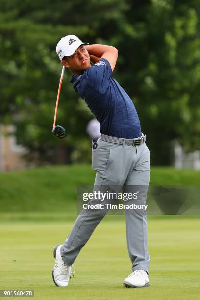 Xander Schauffele watches his second shot on the sixth hole during the second round of the Travelers Championship at TPC River Highlands on June 22,...