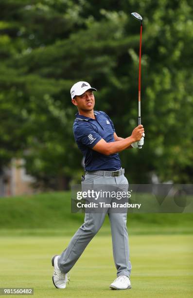 Xander Schauffele watches his second shot on the sixth hole during the second round of the Travelers Championship at TPC River Highlands on June 22,...